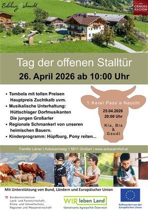 Ein einladendes ländliches Szenario mit Bauernhäusern und grünen Wiesen. Die Veranstaltung "Tag der offenen Stalltür" bietet verschiedene Aktivitäten und Unterhaltung.