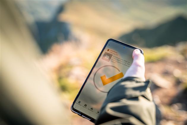 Handybildschirm mit dem digitalen Stempelpass