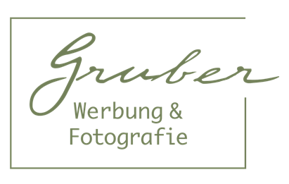 Ein schlichtes, stilisiertes Bild mit einem grünen Hintergrund. Darauf sind weiße Linien, die ein einfaches Muster bilden.