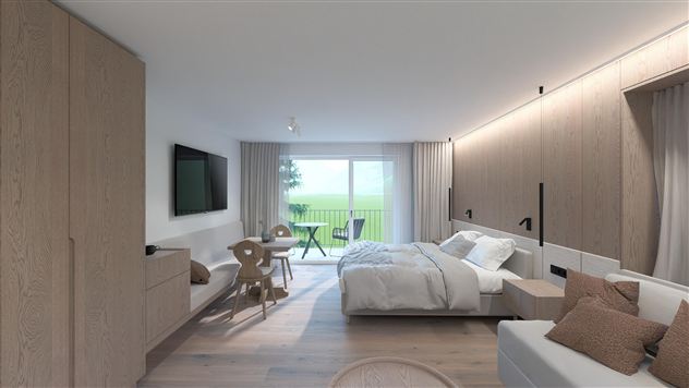 A modern hotel room with a large bed, a television, and a balcony. Bright wooden furniture and an elegant design create an inviting atmosphere.